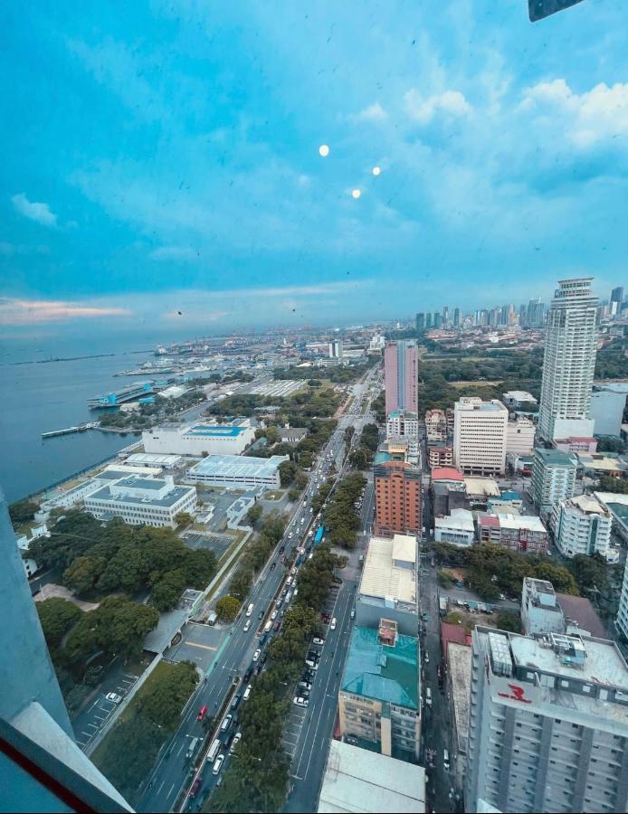 Pearl Of The Orient Tower, In Front Of Us Embassy Apartment Manila Exterior photo