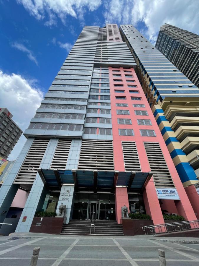 Pearl Of The Orient Tower, In Front Of Us Embassy Apartment Manila Exterior photo