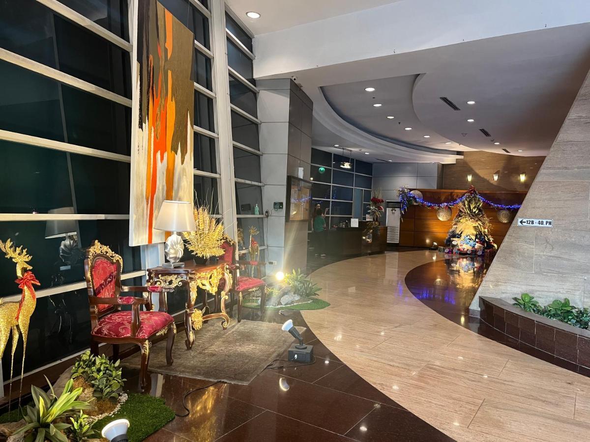 Pearl Of The Orient Tower, In Front Of Us Embassy Apartment Manila Exterior photo
