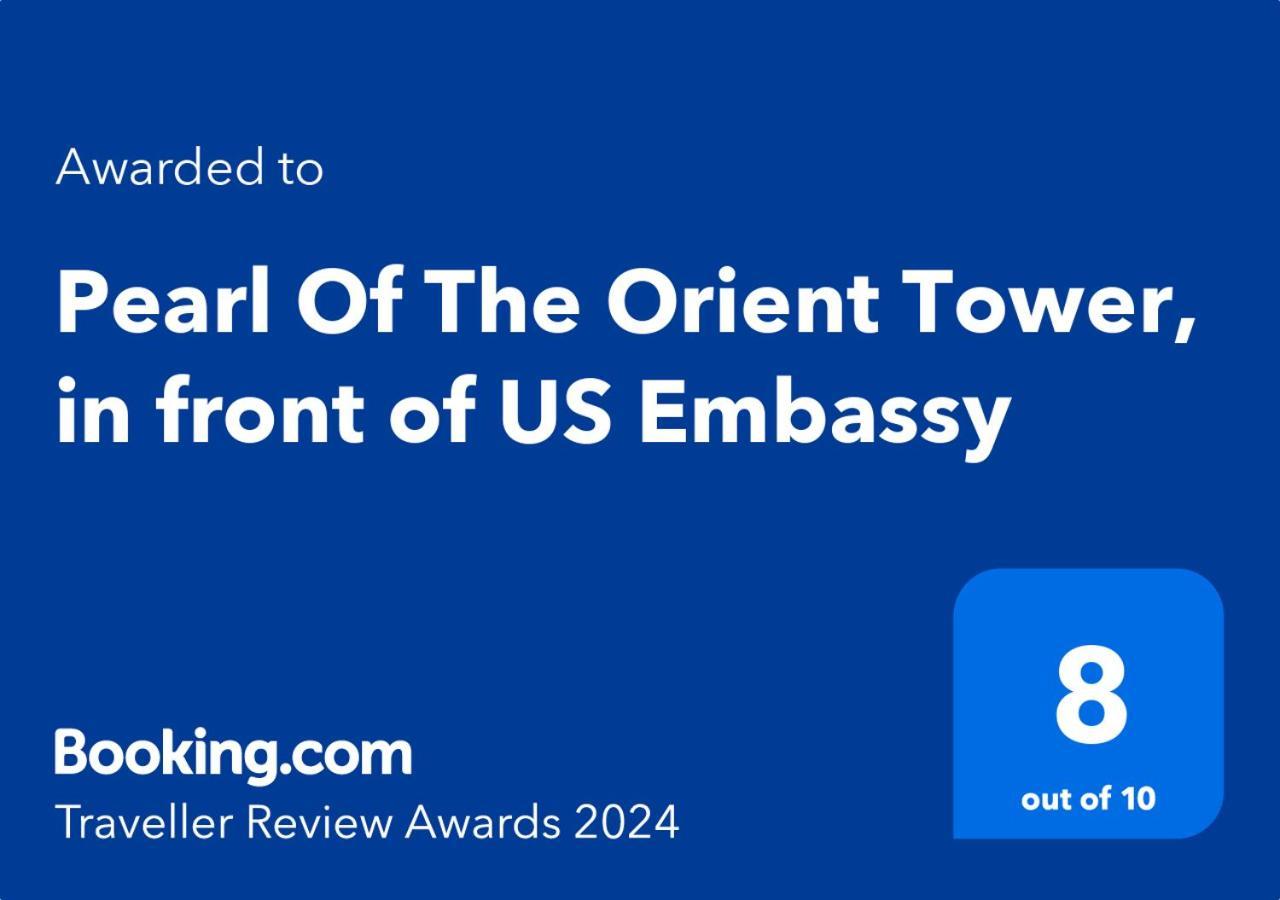 Pearl Of The Orient Tower, In Front Of Us Embassy Apartment Manila Exterior photo
